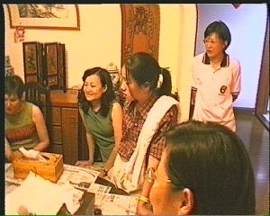 Onlookers watching the calligraphy