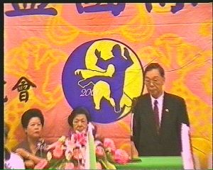 Master Shu gives opening address with backdrop of the professor in background