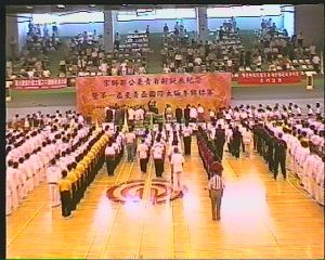 Crowd stands to honor the professor for 1 minute